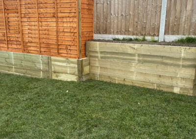Raised sleeper planting beds